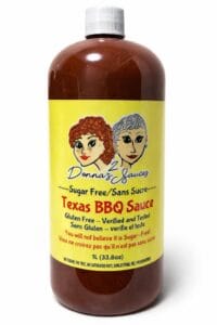 1L bottle of 2 Donna’s Sauces Texas BBQ Sauce with a bright yellow label.