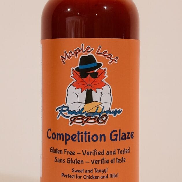 Large 1L bottle of Maple Leaf Roadhouse BBQ Competition Glaze with orange label and maple leaf logo.