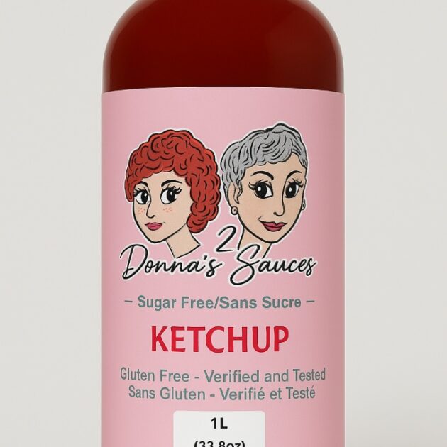 1L bottle of 2 Donna’s Sauces Sugar Free Ketchup featuring a pink label with two illustrated women.